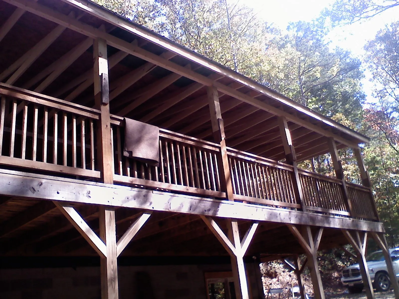 Timber framing under a new elevated porch and deck — Roof Leak Repair in Lostine by Roofing Brothers